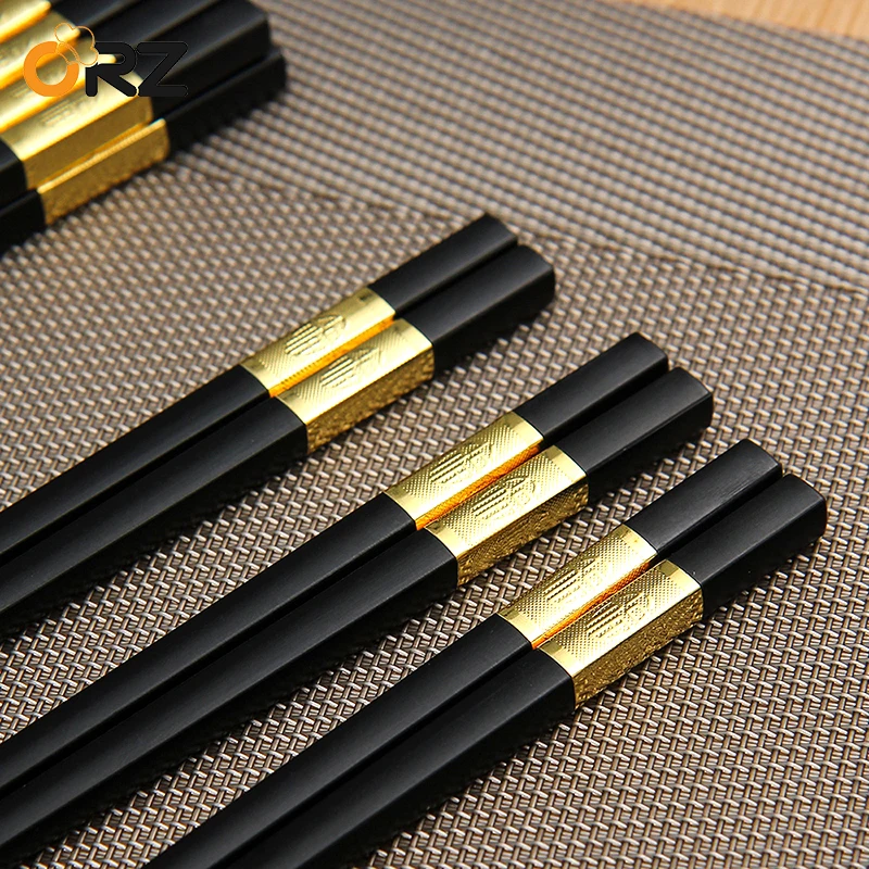 10 Pair Gold Chinese Reusable Chopsticks Fiberglass Square Chinese Sticks Non Slip Hashi Household Dinnerware Cutlery
10 Pair Gold Chinese Reusable Chopsticks Fiberglass Square Chinese Sticks Non Slip Hashi Household Dinnerware Cutlery