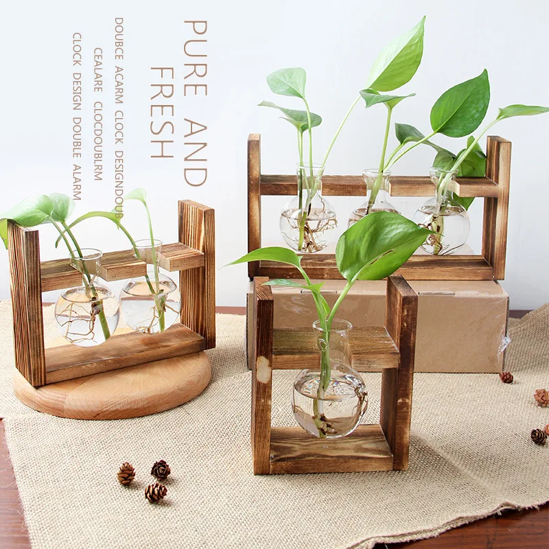 Home Decor Plant Glass Bottle Vases Wooden Display Frame Hydroponic Plants Transparent Flower Pot Wooden Frame Tabletop Vase
Home Decor Plant Glass Bottle Vases Wooden Display Frame Hydroponic Plants Transparent Flower Pot Wooden Frame Tabletop Vase
