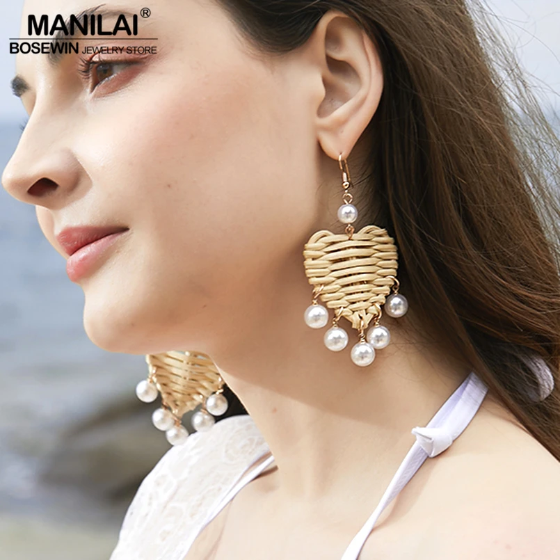 MANILAI Bohemia Straw Rattan Knit Dangle Earrings For Women Imitation Pearl Heart Statement Pendant Earrings Jewelry 2019
MANILAI Bohemia Straw Rattan Knit Dangle Earrings For Women Imitation Pearl Heart Statement Pendant Earrings Jewelry 2019