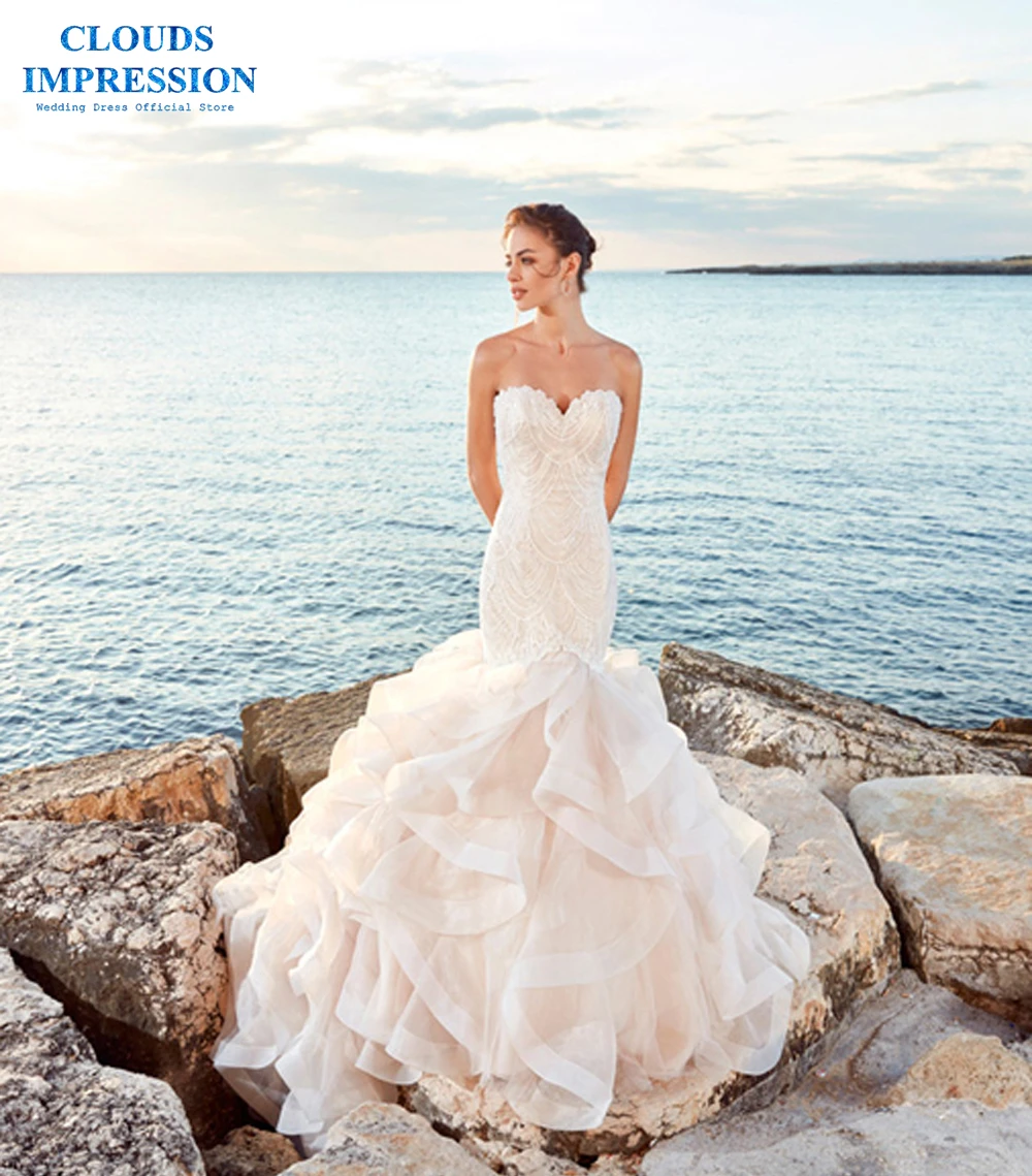 CLOUDS IMPRESSION Romantic Strapless 2019 Mermaid Beach Wedding Dress Lace Beading Vestige De Noiva Tiered Bridal Dress Sexy
CLOUDS IMPRESSION Romantic Strapless 2019 Mermaid Beach Wedding Dress Lace Beading Vestige De Noiva Tiered Bridal Dress Sexy
