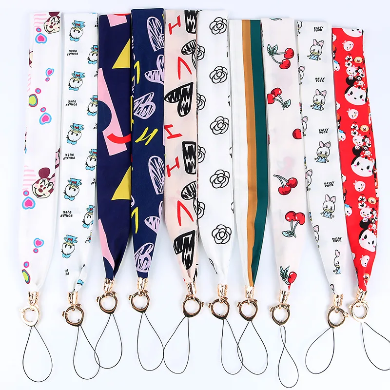 Cute Cartoon Printing Silk Scarf Neck Strap Lanyard For Keys Belt Hang Chain Key ID PASS Card Phone Straps Keychain for Women 
Cute Cartoon Printing Silk Scarf Neck Strap Lanyard For Keys Belt Hang Chain Key ID PASS Card Phone Straps Keychain for Women