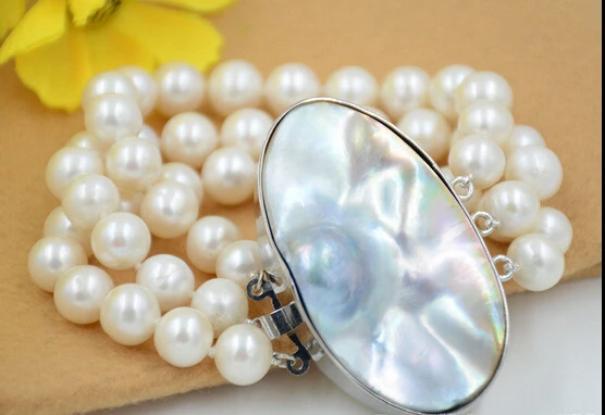shitou 00728 3strands 10-11mm ROUND white Freshwater cultured PEARL bracelet mabe clasp 8inch
shitou 00728 3strands 10-11mm ROUND white Freshwater cultured PEARL bracelet mabe clasp 8inch