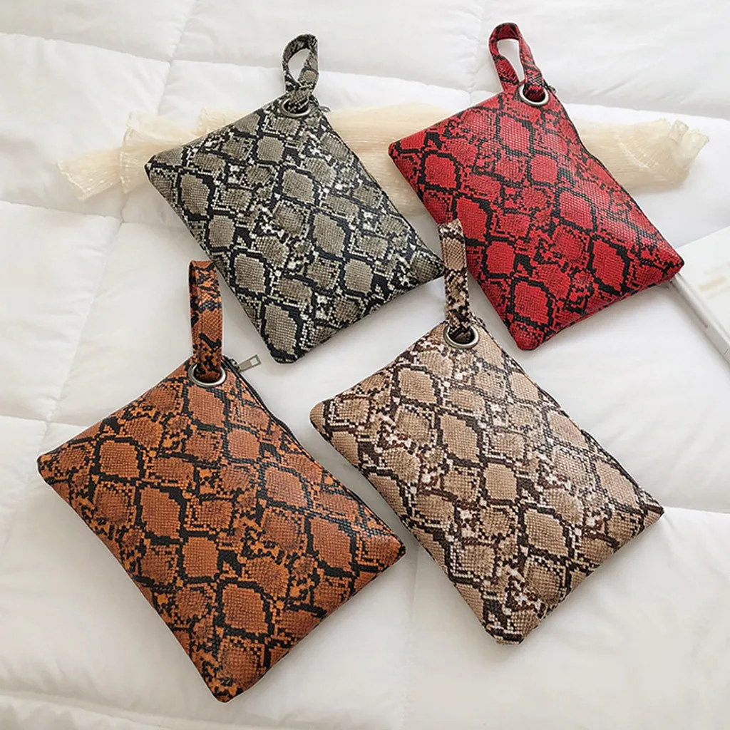 2019 spring and summer new fashion women's shopping zipper snake pattern messenger bag mobile phone bag wallet clutch
2019 spring and summer new fashion women's shopping zipper snake pattern messenger bag mobile phone bag wallet clutch
