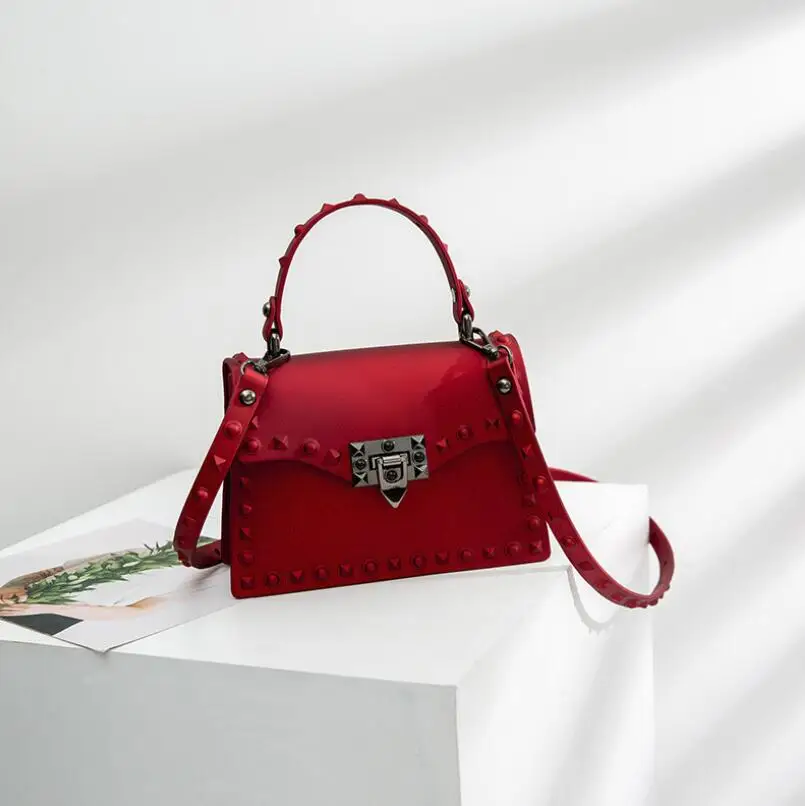 The new women's one-shoulder cross bag is fashionable and versatile with matte rivet jelly bag and portable square bag for women
The new women's one-shoulder cross bag is fashionable and versatile with matte rivet jelly bag and portable square bag for women