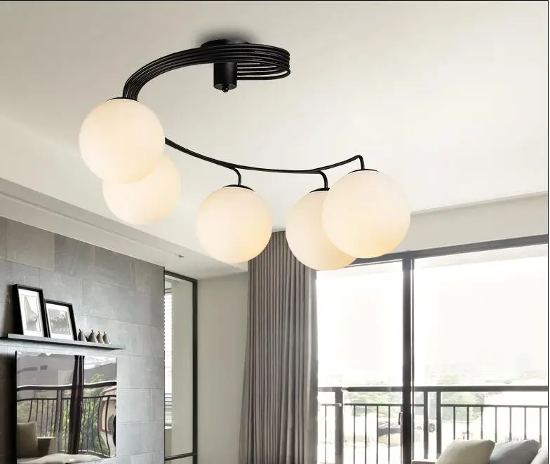 Simple modern absorption lamp. Iron art LED sitting room lamp. Circular romantic lamp