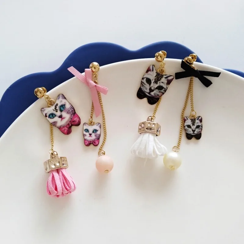 Simple Fashion British Style Cute Cat Bow Tassel Dangle Earrings Girl Women Personality Asymmetry Ear Clip Jewelry Accessories
Simple Fashion British Style Cute Cat Bow Tassel Dangle Earrings Girl Women Personality Asymmetry Ear Clip Jewelry Accessories