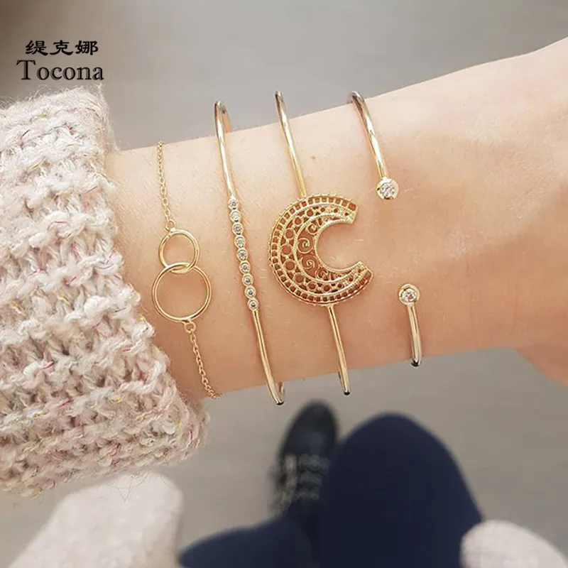 Tocona Women Ladies New Arrival Bohemia Gold Color 4pcs/sets Bracelets Trendy Hollow Round Moon Shape Jewelry Accessories C09205
Tocona Women Ladies New Arrival Bohemia Gold Color 4pcs/sets Bracelets Trendy Hollow Round Moon Shape Jewelry Accessories C09205
