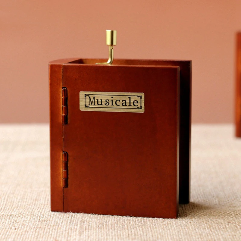 Vintage book hand type shake Musical Boxes Wooden Music Box Wood Crafts Retro Birthday Gift Vintage Home Decoration Accessories
Vintage book hand type shake Musical Boxes Wooden Music Box Wood Crafts Retro Birthday Gift Vintage Home Decoration Accessories