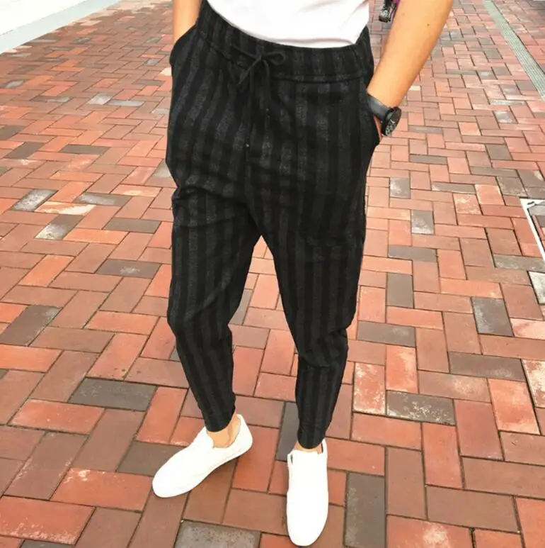 New 2018 men's clothing fashion hair stylist street Korean tide British All-match stripe harem pants costumes
New 2018 men's clothing fashion hair stylist street Korean tide British All-match stripe harem pants costumes