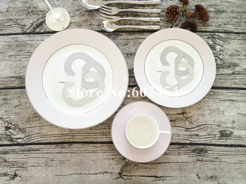 Fashion 10-piece ceramic dinner plate set with tea cup with cutlery set for gift come with orange box
Fashion 10-piece ceramic dinner plate set with tea cup with cutlery set for gift come with orange box