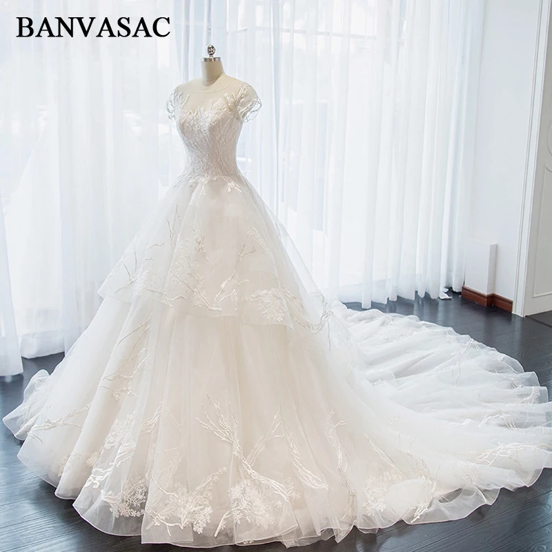 BANVASAC Sheer O Neck 2018 Lace Ball Gown Wedding Dresses Embroidery Appliques Real Photos Cathedral Train Bridal Gowns
BANVASAC Sheer O Neck 2018 Lace Ball Gown Wedding Dresses Embroidery Appliques Real Photos Cathedral Train Bridal Gowns