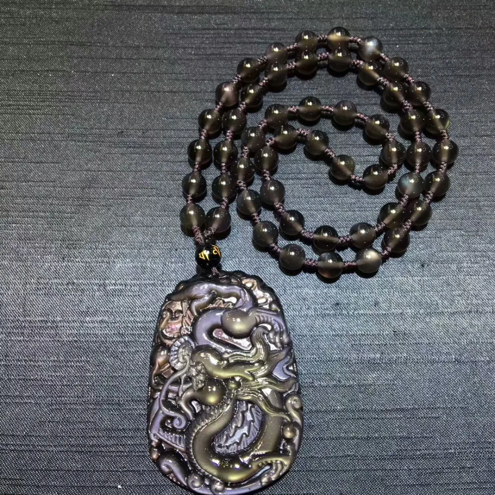 100% Natural Black Obsidian Rainbow Pendant Flash Light Gemstone 62x44x13mm Dragon Shape One Pendant Crystal Necklace AAAAA
100% Natural Black Obsidian Rainbow Pendant Flash Light Gemstone 62x44x13mm Dragon Shape One Pendant Crystal Necklace AAAAA