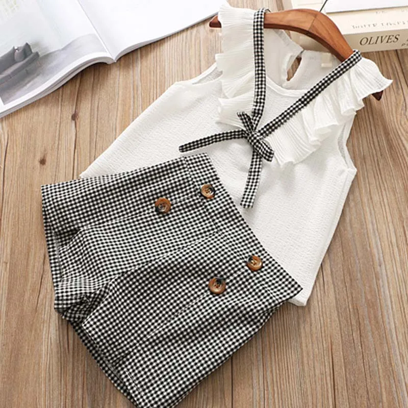 2019 Summer Girls Suit Chiffon Ruffled Bow Tie Vest + Plaid Shorts Two-Piece Girl Suit Children'S Clothing
2019 Summer Girls Suit Chiffon Ruffled Bow Tie Vest + Plaid Shorts Two-Piece Girl Suit Children'S Clothing