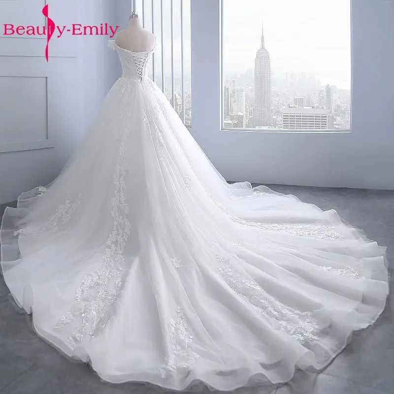 Beauty Emily White Wedding Dresses 2019 Sexy Beads Tulle Appliques Ball Gowns Bride Dress Long Wedding Gowns Custom made
Beauty Emily White Wedding Dresses 2019 Sexy Beads Tulle Appliques Ball Gowns Bride Dress Long Wedding Gowns Custom made