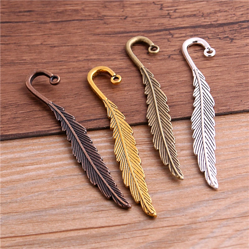 

PULCHRITUDE 4pcs 12*79mm new fashion classics wholesales feather shape four color lead free metal alloy bookmark T6448