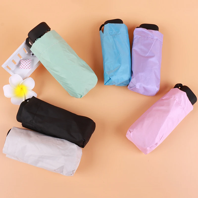 Mini Umbrella Capsule Pocket Light Windproof Folding Umbrellas Travel Compact Rain Umbrella 67DA
Mini Umbrella Capsule Pocket Light Windproof Folding Umbrellas Travel Compact Rain Umbrella 67DA