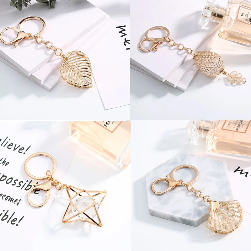 2019 Mix 5 Styles Fashon Keychains for Ladies Kingrings Gold Color Crystal Star Leaf Pendant Keychain Women Gifts
2019 Mix 5 Styles Fashon Keychains for Ladies Kingrings Gold Color Crystal Star Leaf Pendant Keychain Women Gifts
