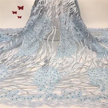 Sky blue sequined lace fabric with 3D daisy flowers, Haute Couture elegant delicate tulle bride wedding lace
Sky blue sequined lace fabric with 3D daisy flowers, Haute Couture elegant delicate tulle bride wedding lace