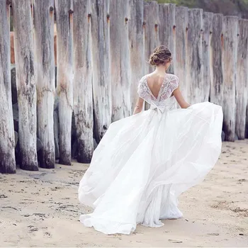 Organza Beach Wedding Party Dresses Cap Sleeves Beaded Crystals Tops A Line Floor Length Prom Gown
Organza Beach Wedding Party Dresses Cap Sleeves Beaded Crystals Tops A Line Floor Length Prom Gown
