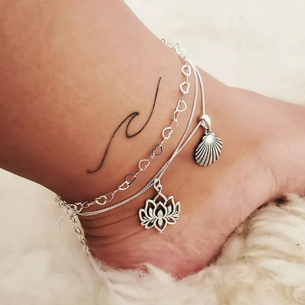 Popular European and American cross-border bohemian alloy lotus shell multi-layer chain ankle anklet foot footrest retro anklet
Popular European and American cross-border bohemian alloy lotus shell multi-layer chain ankle anklet foot footrest retro anklet