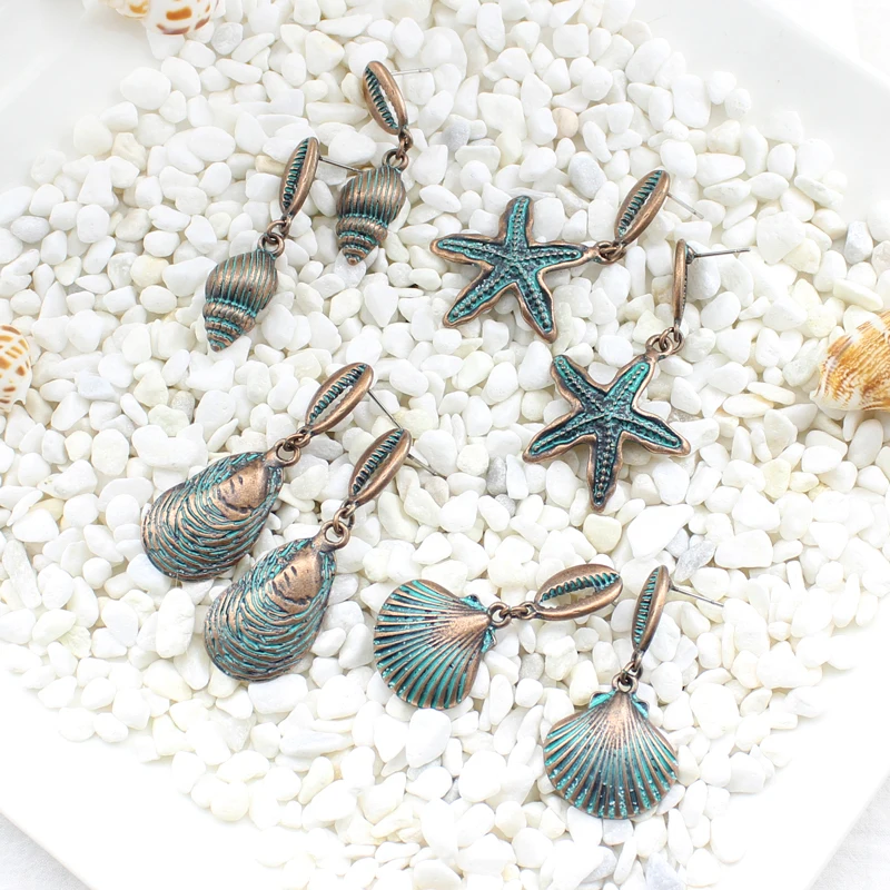 Fashion Beach Ocean Wind Series Conch Shell Starfish Pearl Shape Earrings Imitation bronze vintage metal creative jewelry
Fashion Beach Ocean Wind Series Conch Shell Starfish Pearl Shape Earrings Imitation bronze vintage metal creative jewelry