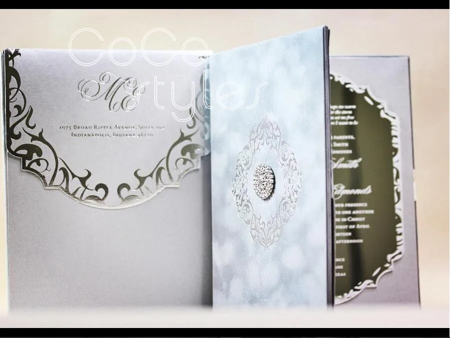 Cocostyles custom premiun gray velvet folded and silver mirror arylic invitation card with crystal brooch for royal wedding
Cocostyles custom premiun gray velvet folded and silver mirror arylic invitation card with crystal brooch for royal wedding