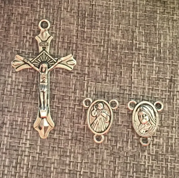 antique silveralloy rosary cross,rosary part,religious alloy cross and center, jesus crucifix and Divine mercy center
antique silveralloy rosary cross,rosary part,religious alloy cross and center, jesus crucifix and Divine mercy center