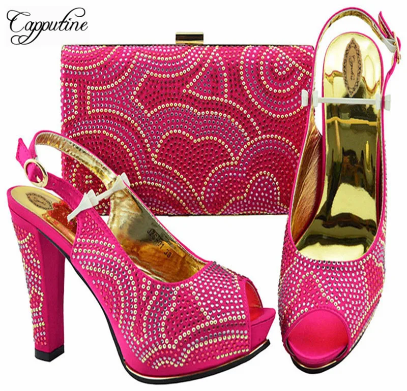 Capputine Fuchsia Color Italian Pretty High Heels Shoes And Bag Set African Style Full Rhinestone Shoes And Bag Set For Party
Capputine Fuchsia Color Italian Pretty High Heels Shoes And Bag Set African Style Full Rhinestone Shoes And Bag Set For Party