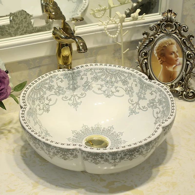 Jingdezhen ceramic art countertop wash basin bowl for bathroom lavabo sink gold Bathroom sink wash basin flower shape
Jingdezhen ceramic art countertop wash basin bowl for bathroom lavabo sink gold Bathroom sink wash basin flower shape