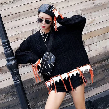 Weird girl autumn new women's Korean version of the loose set head Mao Su collar twist long sleeve tassel blouse sweater
Weird girl autumn new women's Korean version of the loose set head Mao Su collar twist long sleeve tassel blouse sweater