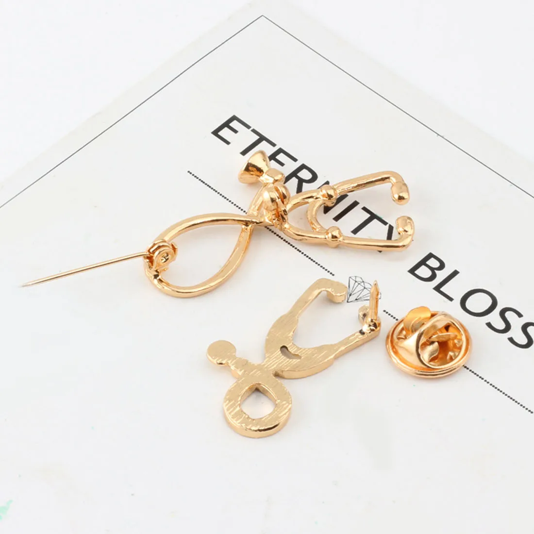 Fashion creative cartoon stethoscope brooch plating alloy brooch unisex clothing accessories Jackets Collar Badge Pins Button
Fashion creative cartoon stethoscope brooch plating alloy brooch unisex clothing accessories Jackets Collar Badge Pins Button