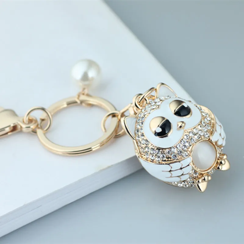 Creative cartoon car keychain exquisite crystal owl car key ring girl bag pendant jewelry couple gift rhinestone key chain
Creative cartoon car keychain exquisite crystal owl car key ring girl bag pendant jewelry couple gift rhinestone key chain