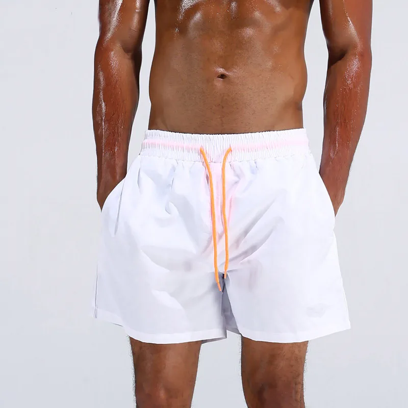 UMLIFE Swim Trunks Men Breathable Sport Swimming Shorts Solid Color Swim Briefs Elastic Waist Beach Shorts Summer Swim Shorts (2)