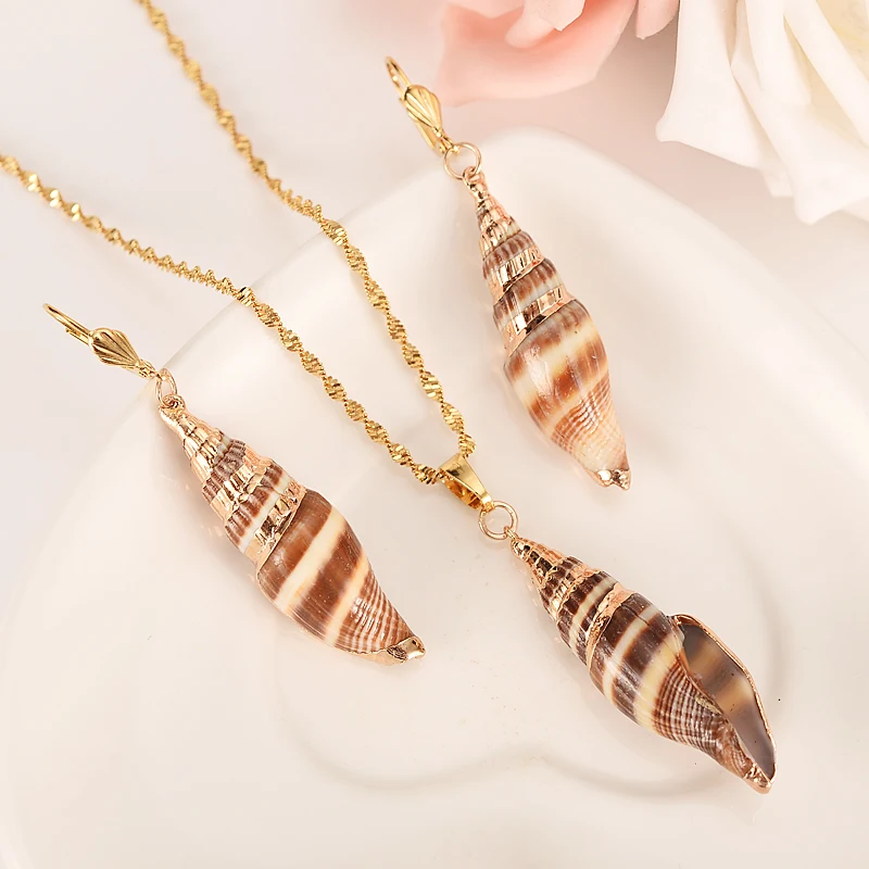 Gold Dubai PNG conch shellvintage dangle Earrings Necklace Jewelry Sets for Women Girls Jewelry Wholesale accessories best gift
Gold Dubai PNG conch shellvintage dangle Earrings Necklace Jewelry Sets for Women Girls Jewelry Wholesale accessories best gift