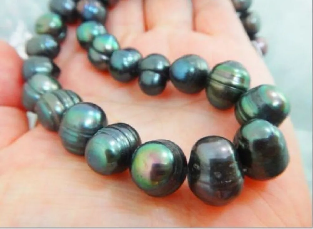 fastGenuine 17" south sea 10-12mm black pearl necklace 14KGP yellow Gold Clasp
fastGenuine 17" south sea 10-12mm black pearl necklace 14KGP yellow Gold Clasp