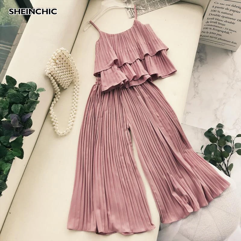 Vintage Summer 2019 Vacation Beach Women 2 Piece Set Elegant Ruffles Pleated Chic Tops And Ankle Length Pants Two Piece Set Suit
Vintage Summer 2019 Vacation Beach Women 2 Piece Set Elegant Ruffles Pleated Chic Tops And Ankle Length Pants Two Piece Set Suit