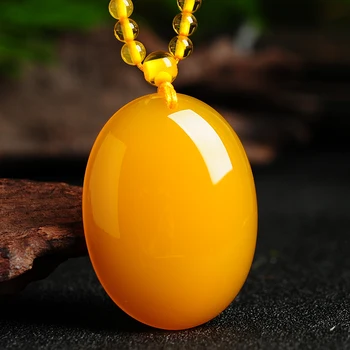 Natural yellow beeswax chalcedony egg face large pendant atmospheric men and women pendant with high-grade beads chain
Natural yellow beeswax chalcedony egg face large pendant atmospheric men and women pendant with high-grade beads chain