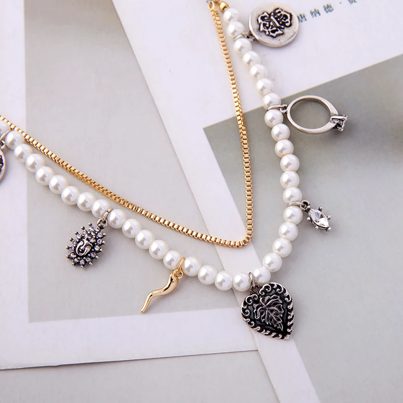 Boho Imitation Pearls Short Necklace Vintage Silver Color Ancient Roman Figure Pendants Layered Jewelry For Women Fashion
Boho Imitation Pearls Short Necklace Vintage Silver Color Ancient Roman Figure Pendants Layered Jewelry For Women Fashion