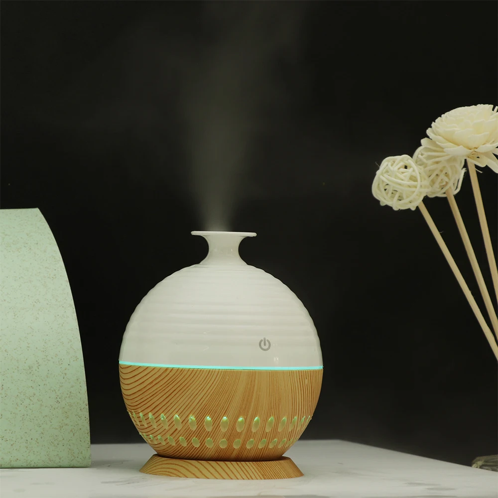 USB Aroma Essential Oil Diffuser Ultrasonic Mist Humidifier Air Purifier 7 Color Change LED Night light for Office Home 130ml
USB Aroma Essential Oil Diffuser Ultrasonic Mist Humidifier Air Purifier 7 Color Change LED Night light for Office Home 130ml