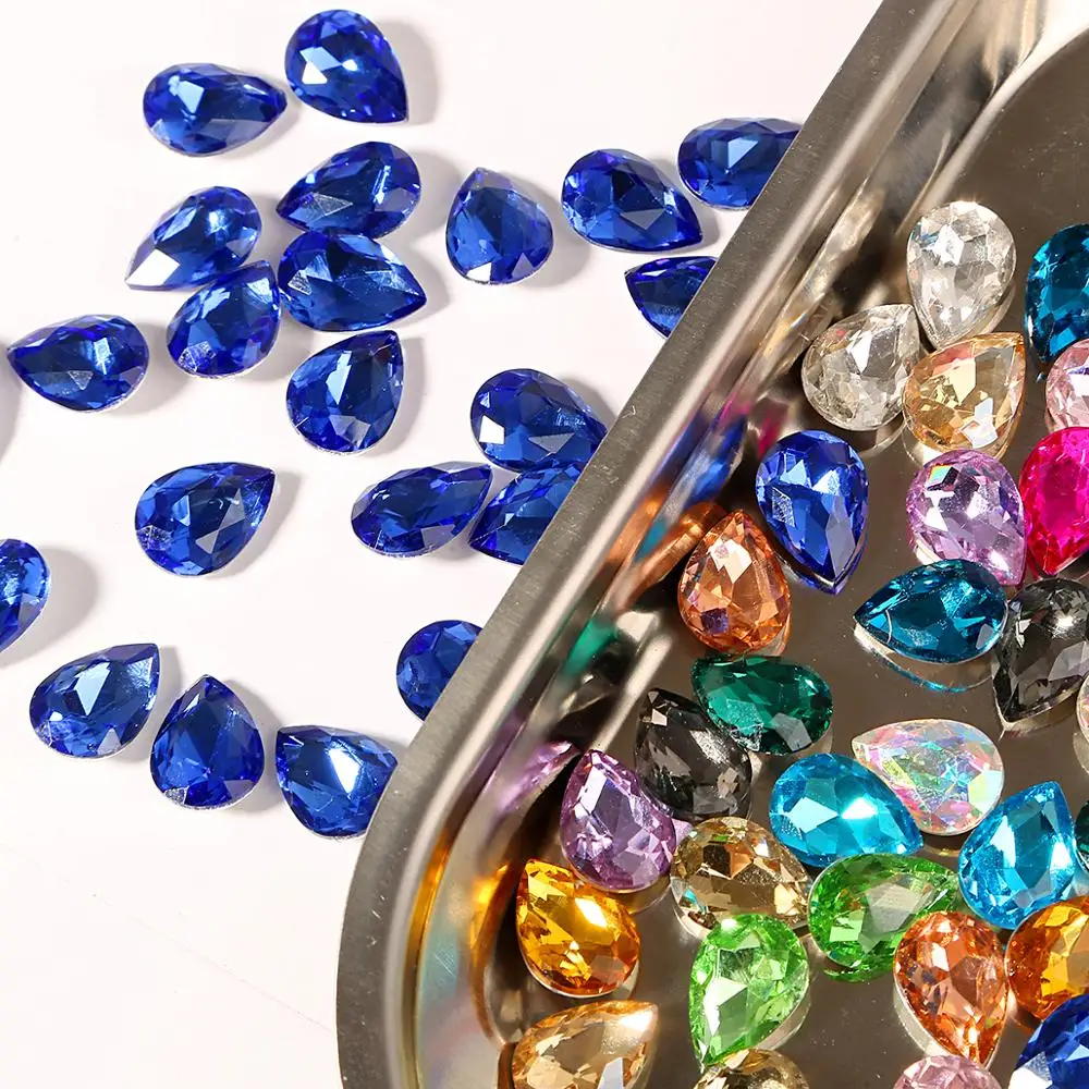 50pcs Tear drop Loose Rhinestones 7x10mm Crystal Glass Sew On Stones For DIY Nail Art Clothing Wedding Dress Decoration
50pcs Tear drop Loose Rhinestones 7x10mm Crystal Glass Sew On Stones For DIY Nail Art Clothing Wedding Dress Decoration