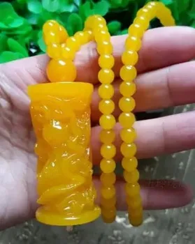 Hand carved yellow beeswax Dragon Pendant with exquisite beeswax BEAD NECKLACE BOUTIQUE sweater chain
Hand carved yellow beeswax Dragon Pendant with exquisite beeswax BEAD NECKLACE BOUTIQUE sweater chain
