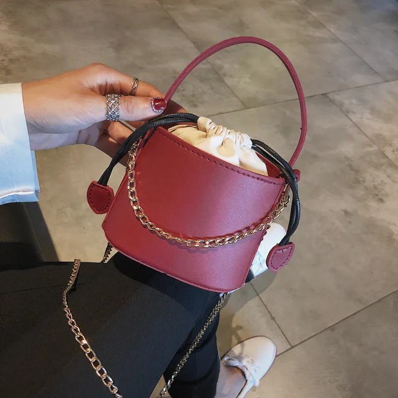 2018 original design mini Bucket bag Rope pulling handbag personality small bag trend shoulder Messenger bag Barrel type
2018 original design mini Bucket bag Rope pulling handbag personality small bag trend shoulder Messenger bag Barrel type