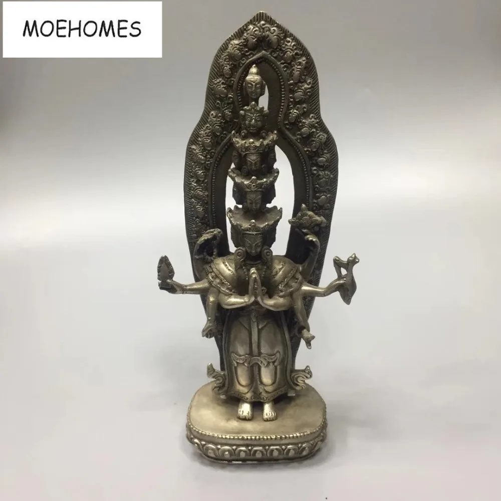 MOEHOMES tibet buddhism fane silver 5 layers 6 arms and 15 sides buddha statue home decoration metal handicraft.
MOEHOMES tibet buddhism fane silver 5 layers 6 arms and 15 sides buddha statue home decoration metal handicraft.