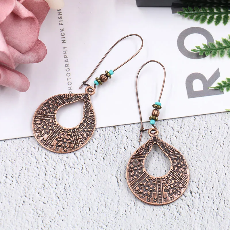 TopHanqi Bohemia Zinc Alloy Long Water Drop Earring Women Fashion Vintage Carved Alloy Earrings Femme Jewelry Gift Brincos 2018
TopHanqi Bohemia Zinc Alloy Long Water Drop Earring Women Fashion Vintage Carved Alloy Earrings Femme Jewelry Gift Brincos 2018