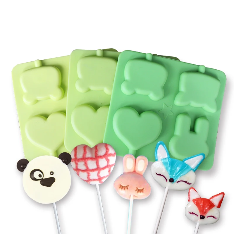 1pc 4 holes animal ice silicone candy mold cute heart and bear designs silicone mould for candy chocolate and soap
1pc 4 holes animal ice silicone candy mold cute heart and bear designs silicone mould for candy chocolate and soap