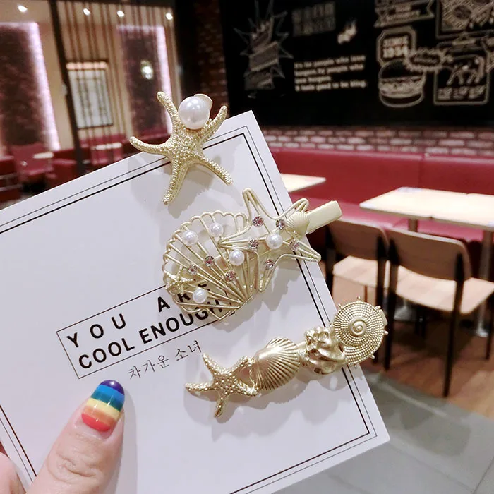 Vintage Palace Pearl Crystal Hollow Seashells Starfish Conch Shell Hair Clip Bohemia Seaside Holiday Hairpin For Women Jewelry 
Vintage Palace Pearl Crystal Hollow Seashells Starfish Conch Shell Hair Clip Bohemia Seaside Holiday Hairpin For Women Jewelry
