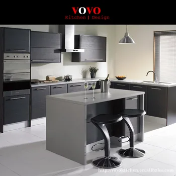 Matte grey lacquer kitchen cabinet with an extended island for breakfast
Matte grey lacquer kitchen cabinet with an extended island for breakfast