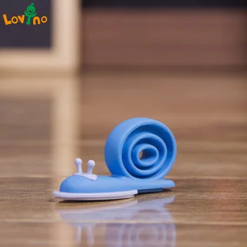 

3Pcs/lot Soft Plastic Baby Home Safety Door Stopper Protector Children Safe Snail Shape Door Stops Baby gate corner protector