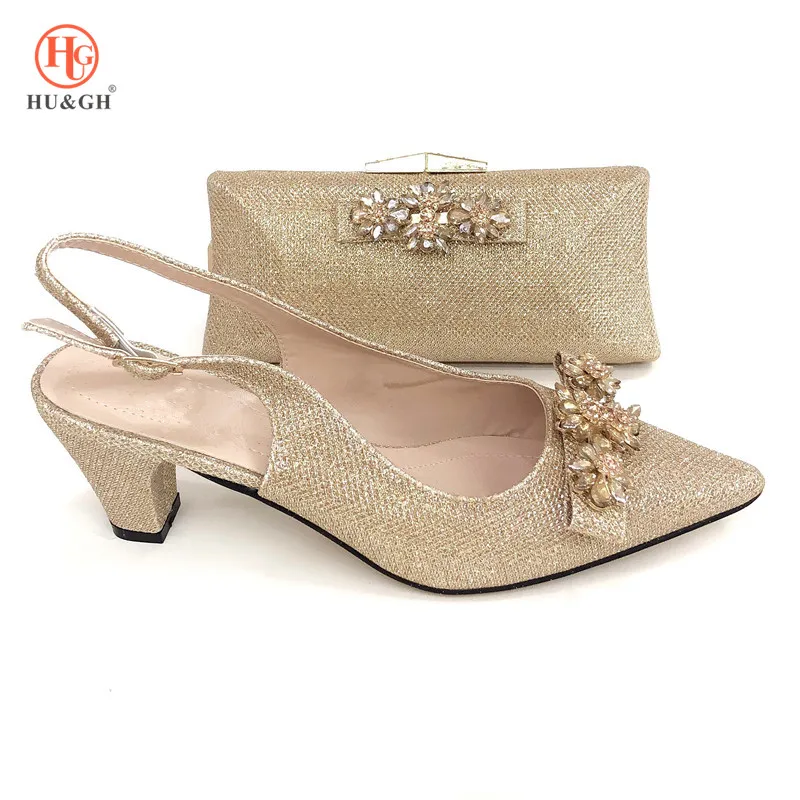 Nice fashion Gold Color Shoes and Bag Matching Set With Crystals High Thin heel 8 CM size 38 to 42 Wedding Party Shoes and Bag
Nice fashion Gold Color Shoes and Bag Matching Set With Crystals High Thin heel 8 CM size 38 to 42 Wedding Party Shoes and Bag