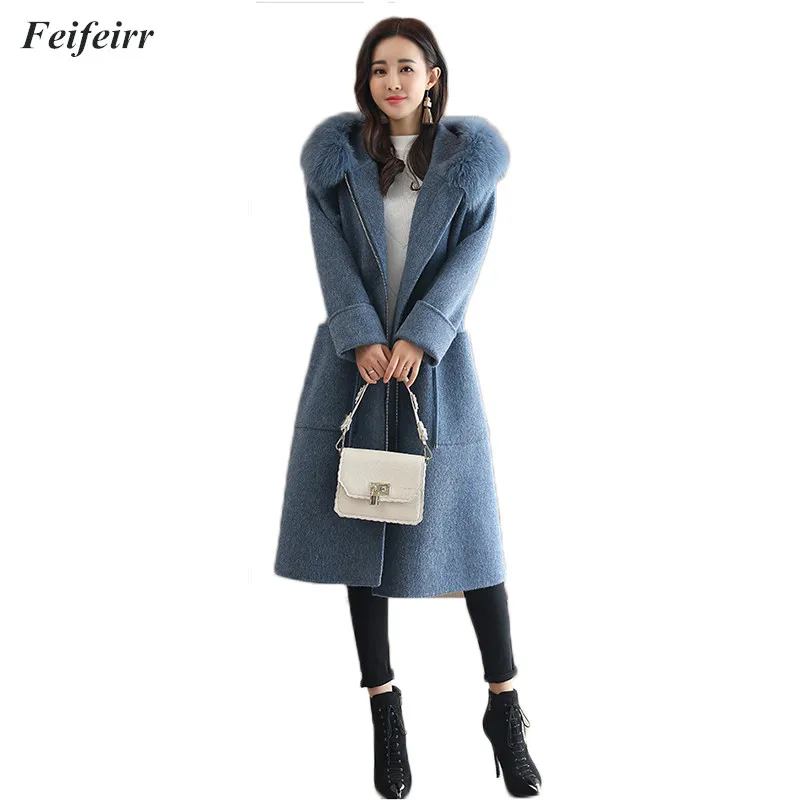 Fashion woolen coat female Autumn Winter Korean version temperament slimming thickening Hooded big fur collar warm woolen jacket
Fashion woolen coat female Autumn Winter Korean version temperament slimming thickening Hooded big fur collar warm woolen jacket